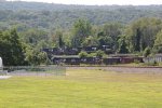 Train 35A passes on the high line through Marysville, while a coal drag is below on G track